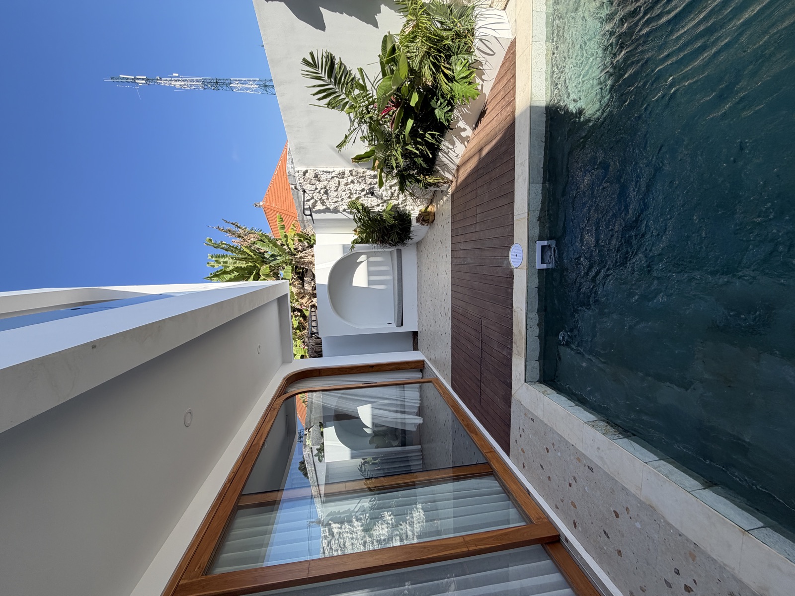 Private pool and sundeck at dusk